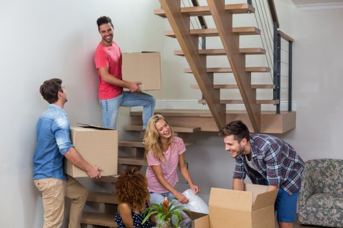 Office relocation planning with labelled boxes and furniture setup