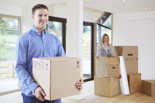 Moving van and packed boxes for a home move in Tooting Bec