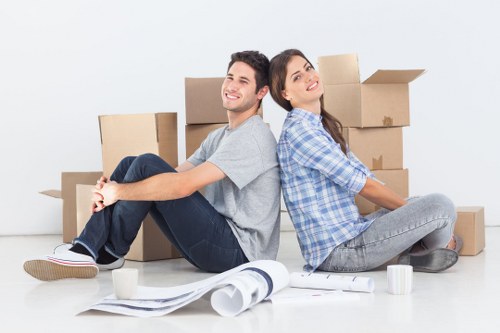 Family preparing boxes and essentials for moving day in Tooting Bec