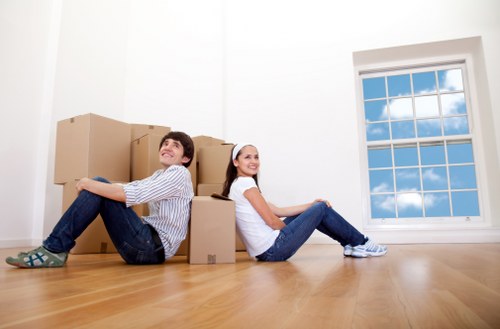 Packed boxes and household items ready for removal day