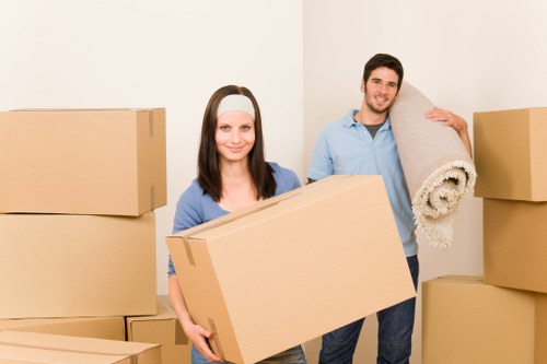 Moving team preparing household items for transport in Tooting Bec