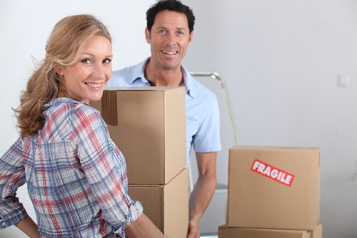 Packed moving boxes and wrapped household items ready for removals